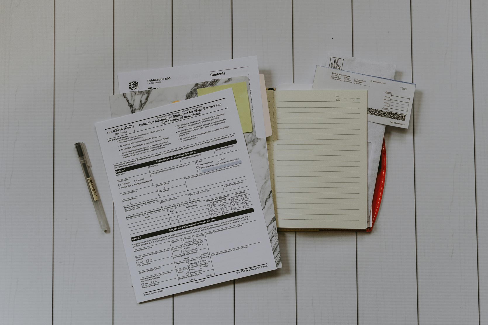 Tax documents piled on top of each other